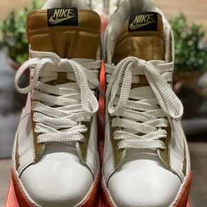 Black, White, and Gold Nike Blazer High